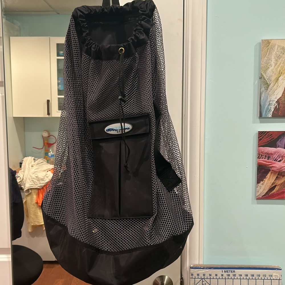 Dive bag. Never used. 29 inches long. 15 inches wide at base.